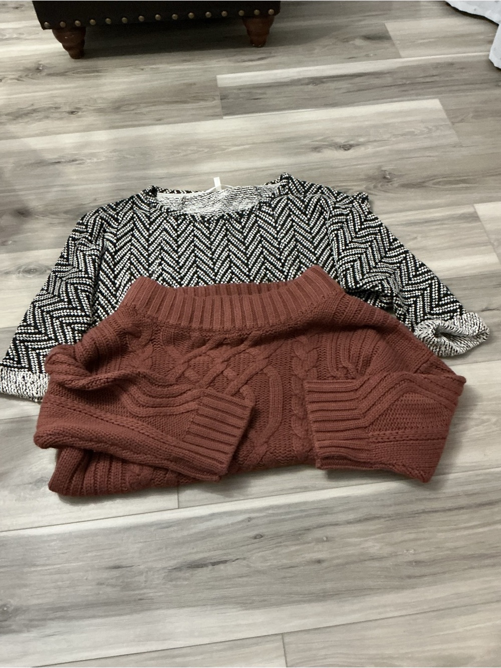 Two size large sweaters